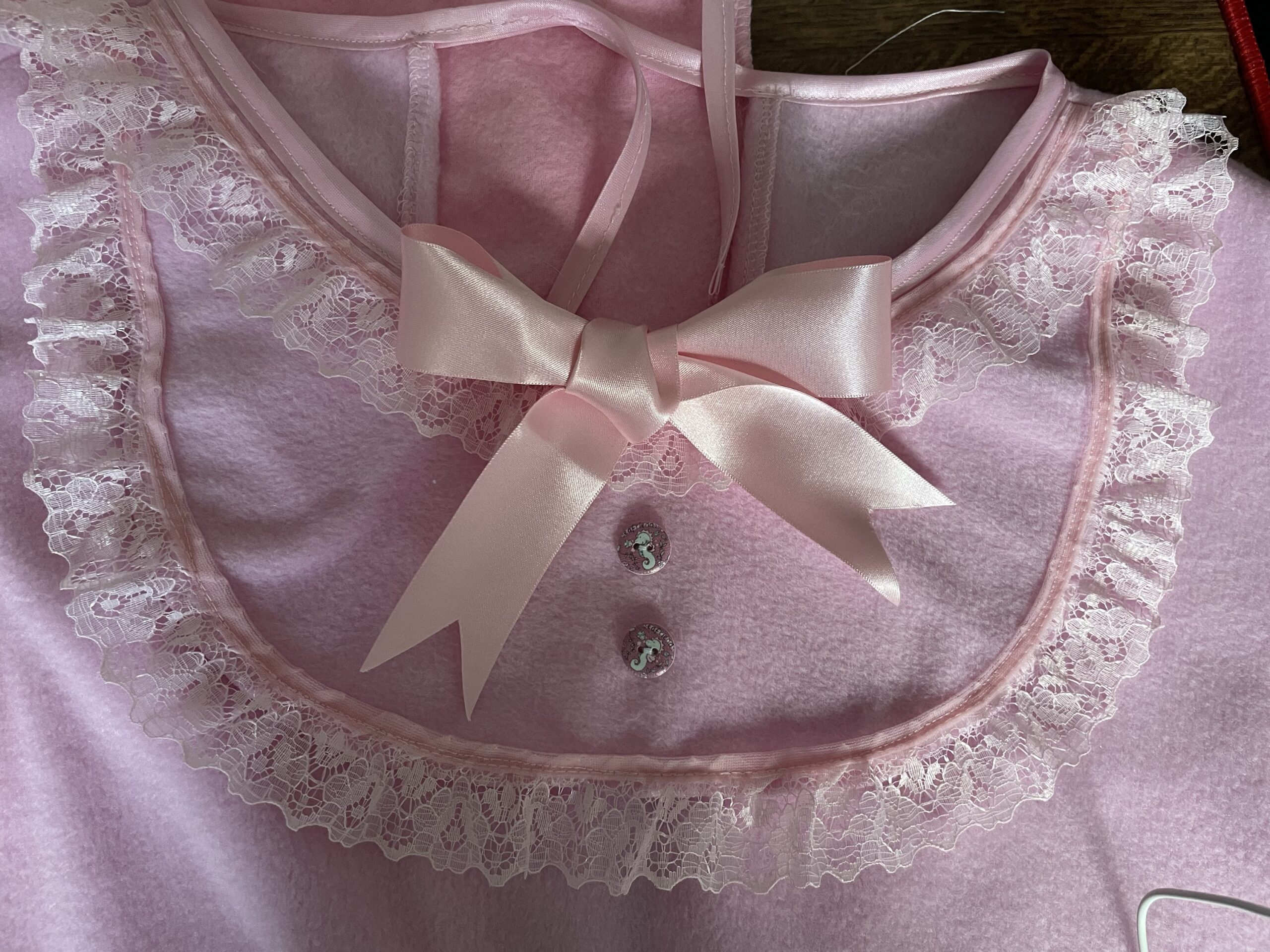 Adultbaby Fleece Sleepsuit with matching lace and ribbon detail ...